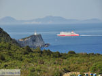 JustGreece.com Bijenkasten at Cape Lefkatas, daarachter een Superfast Ferry Photo 2 - Lefkada (Lefkas) - Foto van JustGreece.com