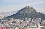 The Lycabetus hill with on the top the white church - Foto van JustGreece.com