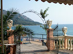 Taverna at the beach of Agios Georgios Corfu - Photo JustGreece.com